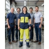 Pantalon de travail haute visibilité Typhon jaune et gris — mise en situation : Industrie, Équipe