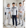 Veste de travail Lulea blanc et gris — mise en situation : batiment_blanc_equipe,
